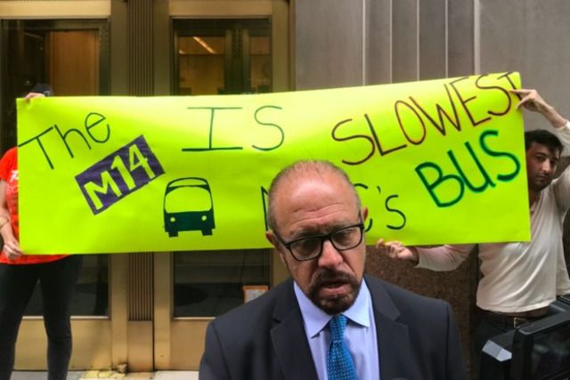Arthur Schwartz, flanked by pro-busway advocates